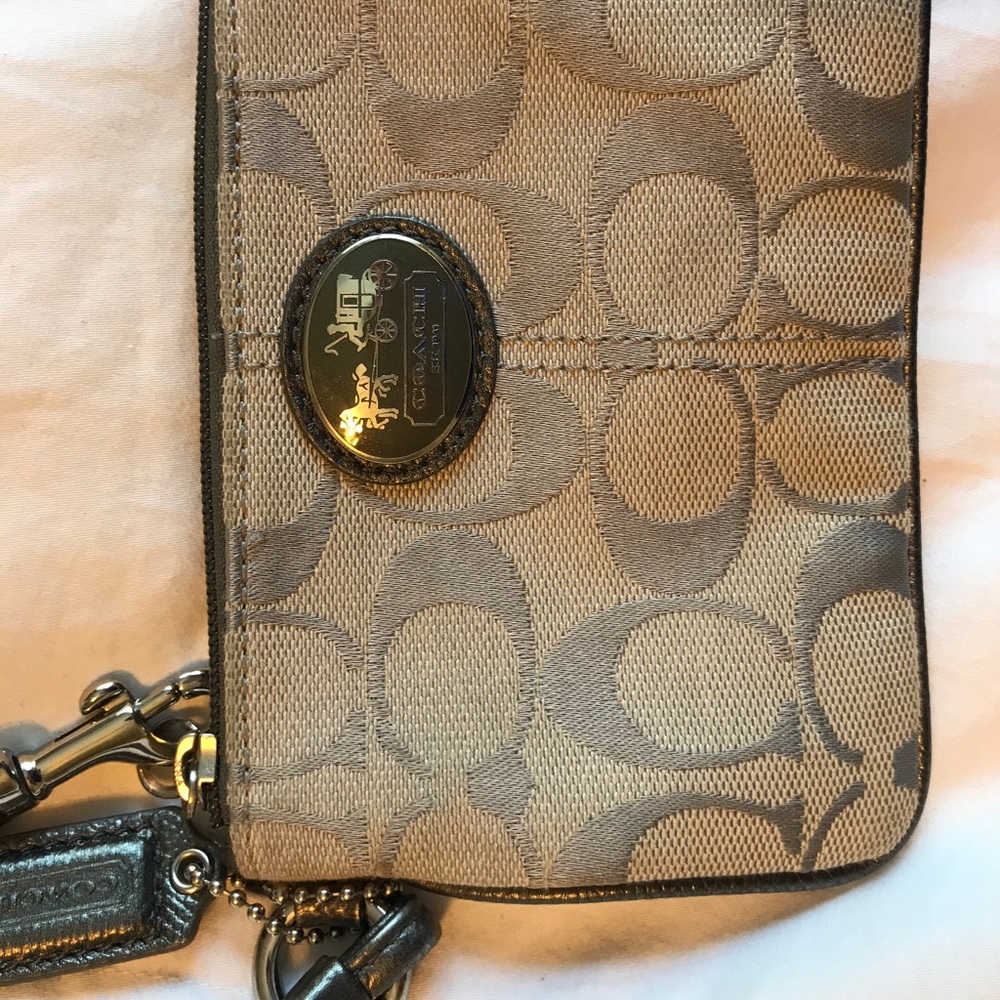 Grey/silver coach wristlet